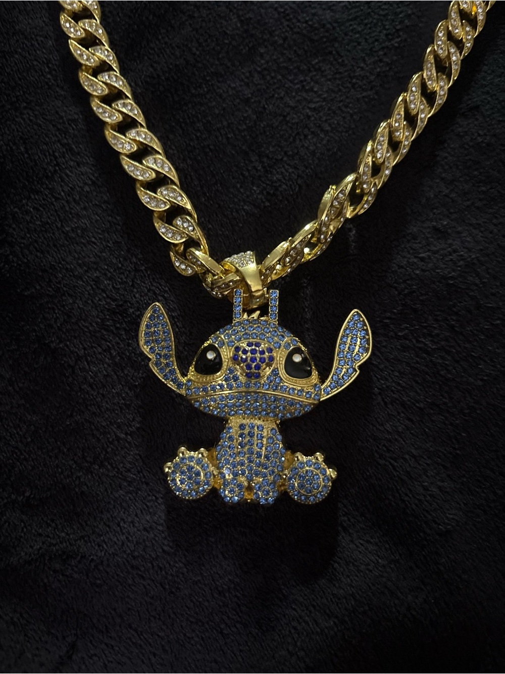 Gold Tone Blue Pave Stitch Pendant Necklace